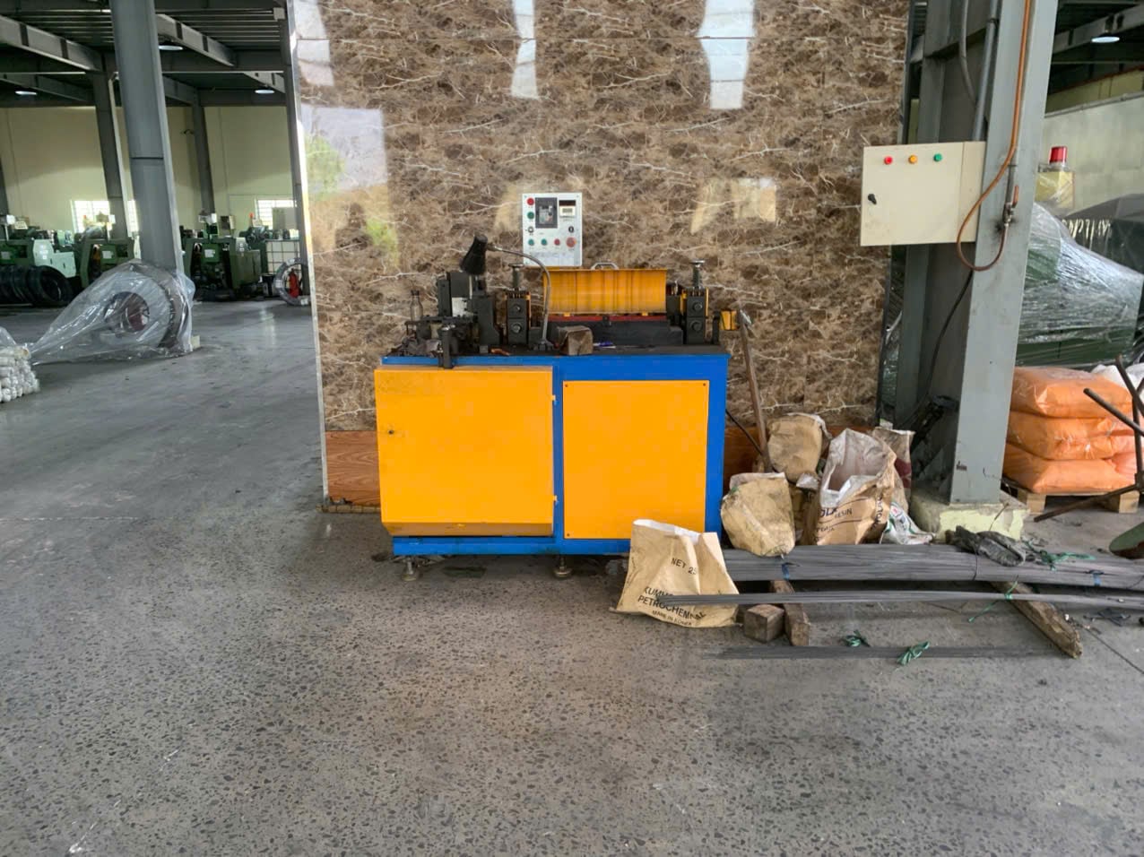 Nail making machine.
